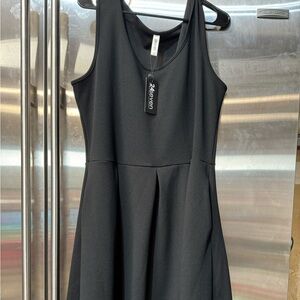 Just above the knee; perfect little black dress. NWT